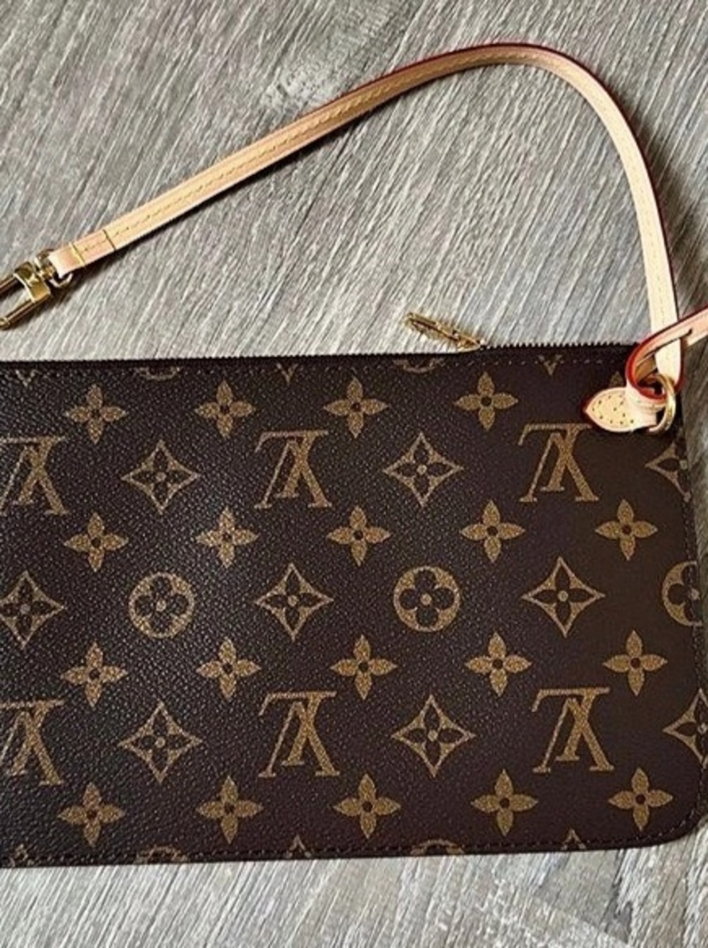 Louis Vuitton Pochette Monogram in Brown